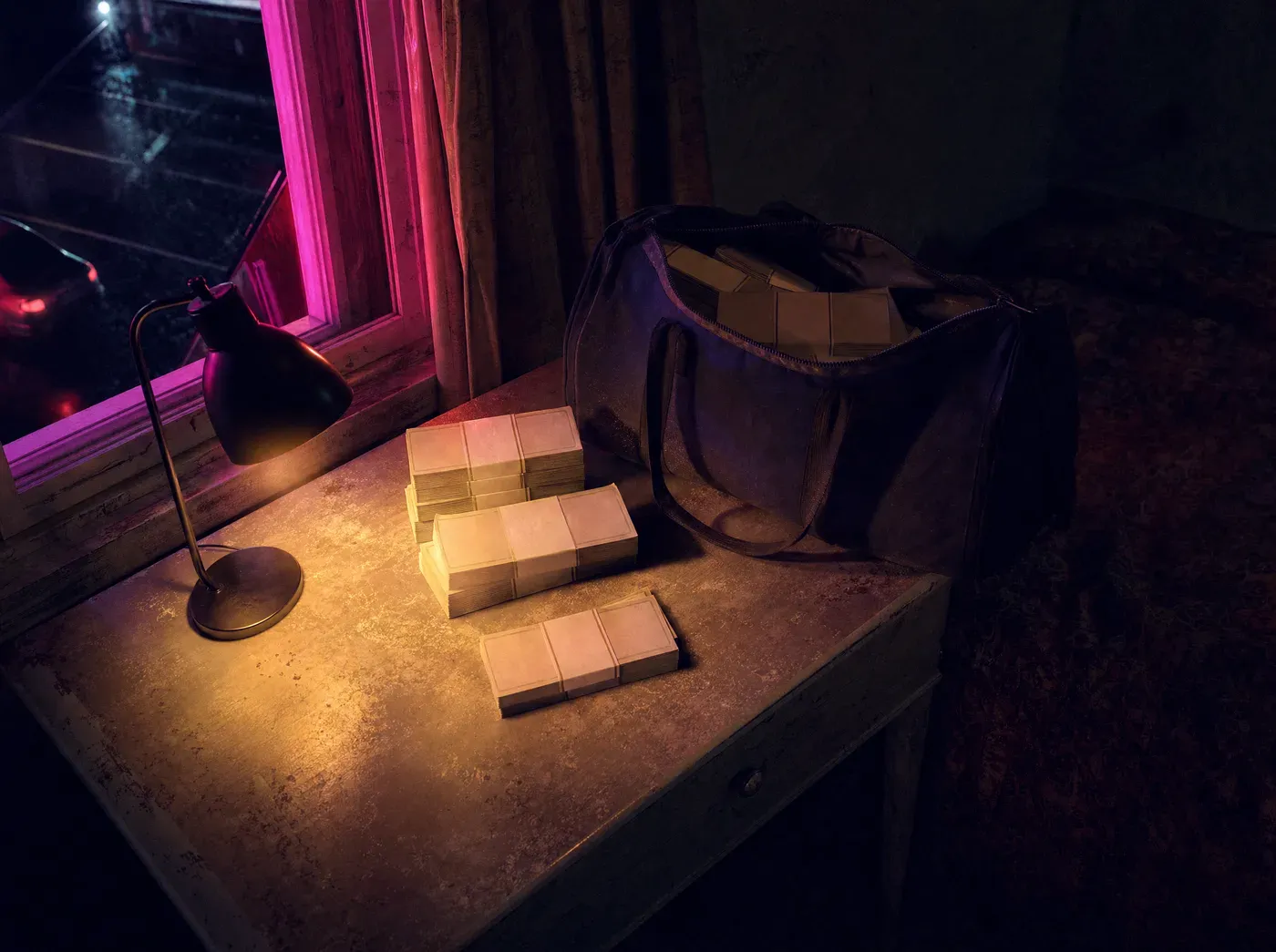 Stacks of cash beside an open duffel bag on a motel table at night